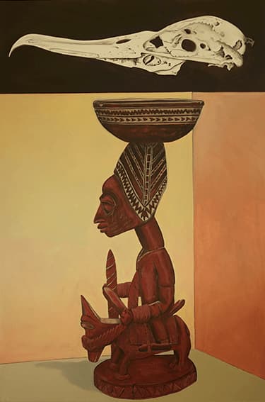 Nigerian icon of mother and child with bird skull on top 